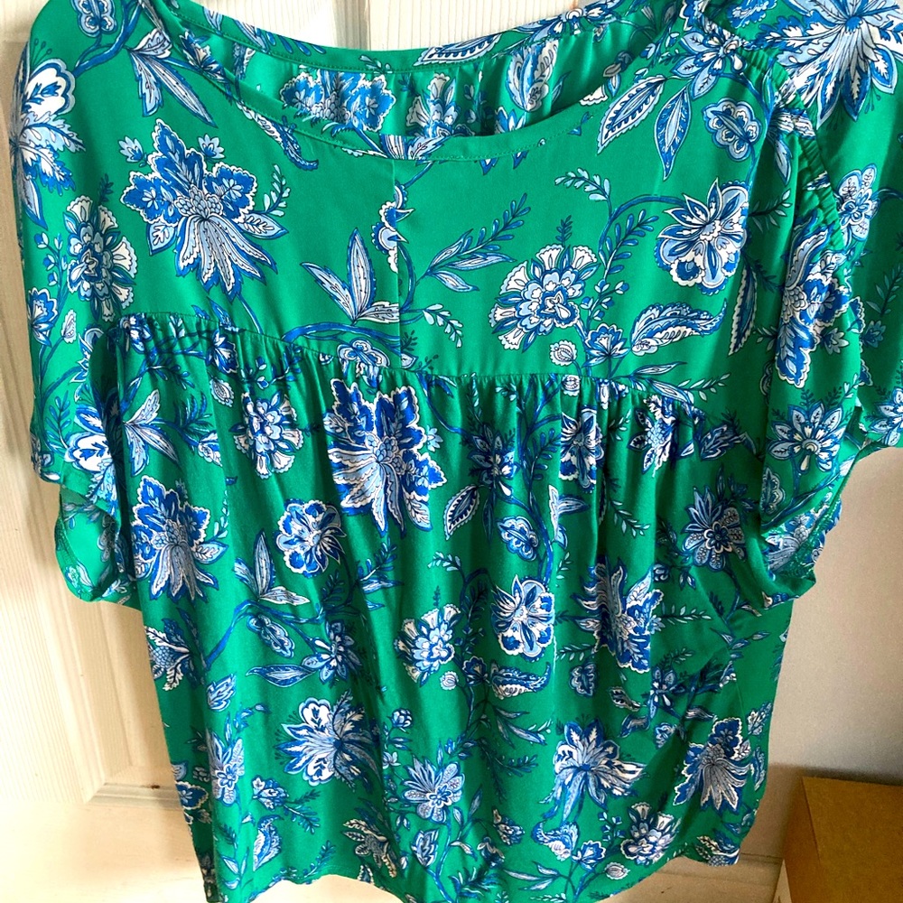 Green and blue business casual top.